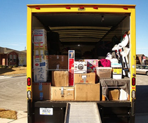packed moving truck ready to get unloaded at final destination